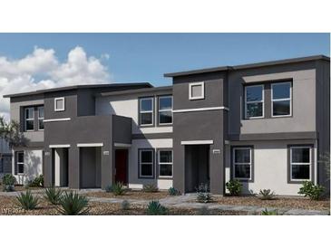 Modern 2-story townhouses with attached garages and desert landscaping at 9368 Serene Harbor St # Lot 30, Las Vegas, NV 89178