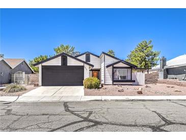 Charming single-story home with a two-car garage and well-maintained landscaping at 3875 Sebasco Dr, Las Vegas, NV 89147