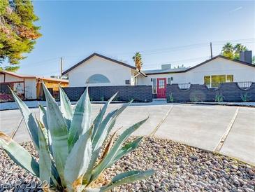 Updated single story home with modern curb appeal and a large driveway at 3123 Congress Ave, Las Vegas, NV 89121