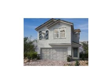 Two-story home with gray siding, shutters, and a two-car garage at 9138 Vesey Ave, Las Vegas, NV 89148