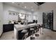 Modern kitchen with white cabinets and a wine cellar at 512 Overlook Rim Dr, Henderson, NV 89012