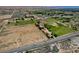 Aerial view showing house and surrounding farmland and desert landscape at 2200 N Moapa Valley Blvd, Logandale, NV 89021