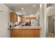 Kitchen with wood cabinets, a breakfast bar, and recessed lighting at 435 Glade Rd, Mesquite, NV 89027