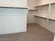 Large walk-in closet with ample shelving and hanging space at 50 Barrio Alto Ct, Henderson, NV 89011