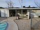 Backyard with patio, pool, and grilling area at 1920 Walnut Ave, Las Vegas, NV 89101