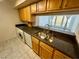 Kitchen with granite countertops and stainless steel sink at 2838 Geary Pl # 4006, Las Vegas, NV 89109