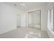 Bright bedroom with mirrored closet doors at 3728 Cottage Canyon St, Laughlin, NV 89029