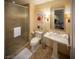 Bathroom with a pedestal sink, toilet and a shower with glass enclosure at 2000 N Fashion Show Dr # 1906, Las Vegas, NV 89109