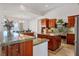 Modern kitchen with stainless steel appliances and granite countertops at 4751 W Adkisson St, Pahrump, NV 89060