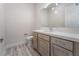 Modern bathroom with vanity, toilet, and floating shelves at 6235 Fire Lake Ct, Las Vegas, NV 89149