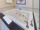 Relaxing corner bathtub with jets and granite counter at 135 E Harmon Ave # 2104, Las Vegas, NV 89109