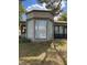 Exterior view of home with bay window and lawn at 5438 Birchbrook Ct, Las Vegas, NV 89120