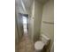 Bathroom with toilet and access to other rooms at 1209 Equator Ave, North Las Vegas, NV 89032