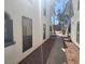 Condo walkway leading to a community pool and common areas at 2812 Bluegill Way # A, Henderson, NV 89014