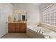 Bathroom boasts a relaxing bathtub and double vanity at 437 Via Ventana Dr, Mesquite, NV 89027