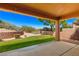 Covered patio offering a view of the landscaped backyard at 437 Via Ventana Dr, Mesquite, NV 89027