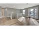 Entryway with wood-look floors, gray walls, and natural light at 909 Rhyolite Ter, Henderson, NV 89011