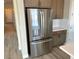 Stainless steel refrigerator with water and ice dispenser at 9166 Chandler Bloom Ct, Las Vegas, NV 89139