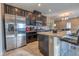 Modern kitchen with stainless steel appliances and granite countertop at 2860 Sunflower Days Ave # 2136, North Las Vegas, NV 89031