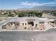 Single-story home with landscaped yard and mountain views at 7052 Maverick St, Las Vegas, NV 89131