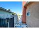 Side yard access with a gate and brick wall at 805 Salem Dr, Las Vegas, NV 89107