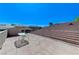 Private rooftop patio with mountain views and a small table at 8275 W Craig Rd, Las Vegas, NV 89129