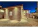 Well lit exterior of casita with brick pavers at 8275 W Craig Rd, Las Vegas, NV 89129