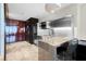 Modern kitchen with stainless steel finishes and breakfast bar at 4381 W Flamingo Rd # 3604, Las Vegas, NV 89103