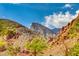 Stunning view of red rock mountains under a blue sky at 14525 Heyer Way, Las Vegas, NV 89161