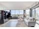 Bright living room boasts floor-to-ceiling windows and city views at 322 Karen Ave # 401, Las Vegas, NV 89109