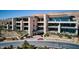 Modern building exterior with landscaped grounds at 11665 Summit Club Dr # 106, Las Vegas, NV 89135