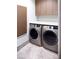 Convenient laundry room with front-load washer and dryer at 11665 Summit Club Dr # 106, Las Vegas, NV 89135