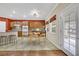 Modern kitchen with wooden cabinets and stainless steel appliances at 167 Rising Mesa Ct, Henderson, NV 89012