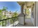 Private balcony overlooking neighborhood with trees and houses at 52 Cascade Lake St, Las Vegas, NV 89148