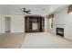 Living room with fireplace, high ceilings, and tile floors at 52 Cascade Lake St, Las Vegas, NV 89148