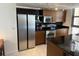 Modern kitchen with stainless steel appliances at 29 Montelago Blvd # 201, Henderson, NV 89011