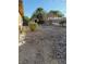 Small backyard with a shed and gravel ground at 2085 Saratoga St, Las Vegas, NV 89146