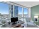 Home office with city view and modern furnishings at 4471 Dean Martin Dr # 2205, Las Vegas, NV 89103