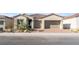 Two-story house with attached garage and landscaping at 8965 Coastal Oaks St, Las Vegas, NV 89166