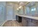 Modern bathroom with double vanity and ample counter space at 4152 Yucca Bloom St # 1, Las Vegas, NV 89135