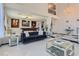 Luxurious living room with a high ceiling, plush velvet sofas, and a crystal chandelier at 420 Dakar St, Henderson, NV 89015