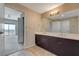 Large bathroom with dual sinks, a tub, and a separate shower at 8255 S Las Vegas Blvd # 1521, Las Vegas, NV 89123