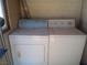 White washer and dryer in a small laundry room at 192 W Alma Ave, Overton, NV 89040