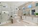 Luxurious bathroom with marble finishes and a large shower at 10309 Saugus Dr, Las Vegas, NV 89134