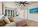 Main bedroom with king bed, fireplace, and sliding doors to a patio at 10309 Saugus Dr, Las Vegas, NV 89134