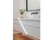 Contemporary bathroom vanity with white countertop and black matte faucet at 6851 Milos Rd, Las Vegas, NV 89118