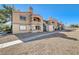 Exterior view of a two-story building with landscaping at 5220 Mission Carmel Ln # 107, Las Vegas, NV 89107