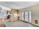 Kitchen with wood cabinets, tile floor, and access to backyard at 108 Palma Del Rio, Las Vegas, NV 89110