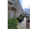 Townhome entrance with landscaping and walkway at 5969 High Steed St # 101, Henderson, NV 89011