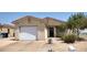 Front view of a single-story house with a gravel driveway at 457 E Merlayne Dr, Henderson, NV 89011